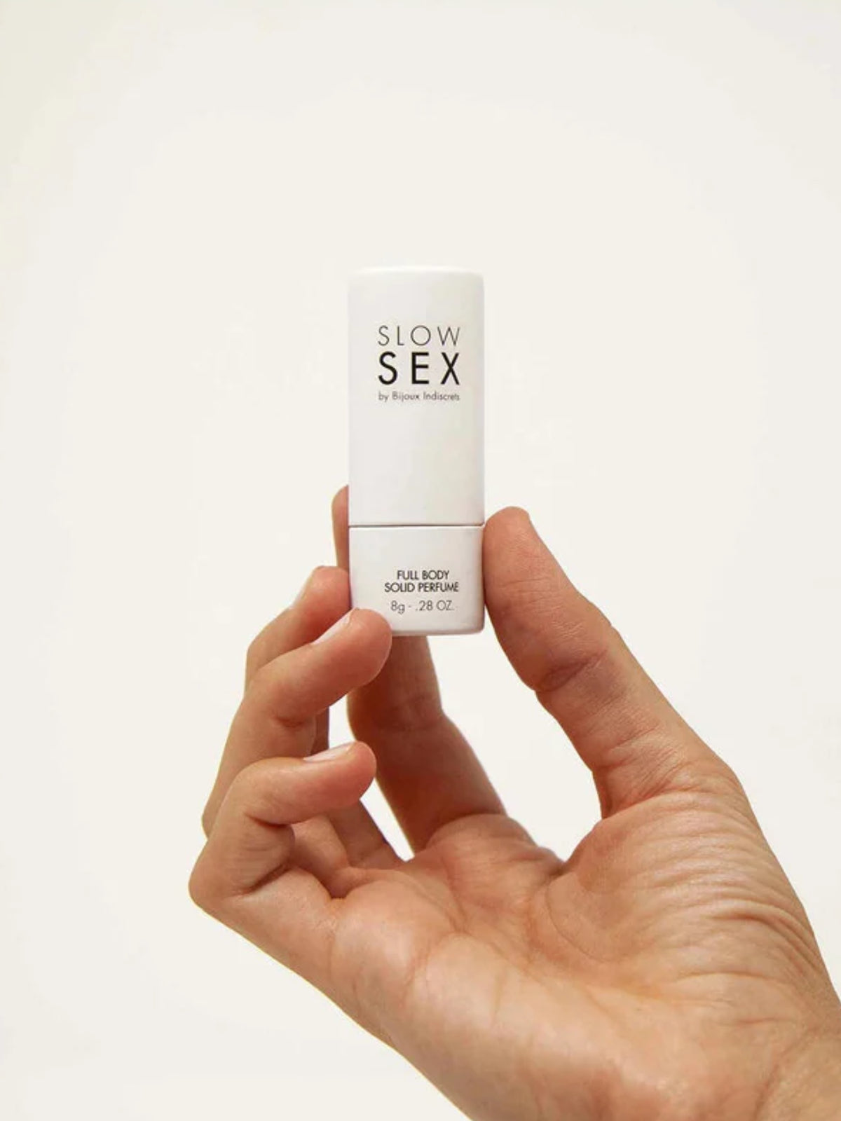 Bijoux Indiscrets intimate solid perfume stick formulated with almond oil, shea butter, and candelilla wax.