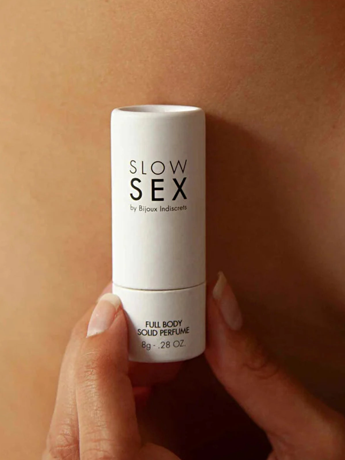 Bijoux Indiscrets intimate solid perfume stick formulated with almond oil, shea butter, and candelilla wax.