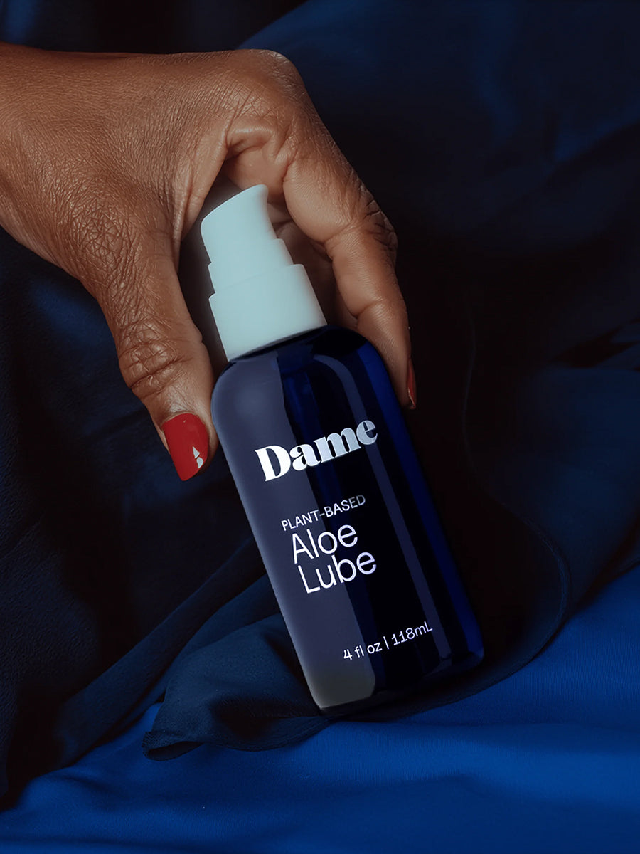 Dame organic aloe vera water-based personal lubricant in a minimalist bottle.