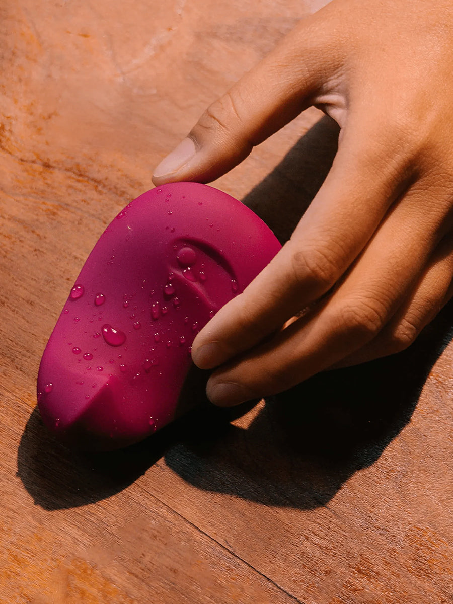 Dame Pom flexible palm vibrator crafted from soft medical-grade silicone for targeted stimulation.