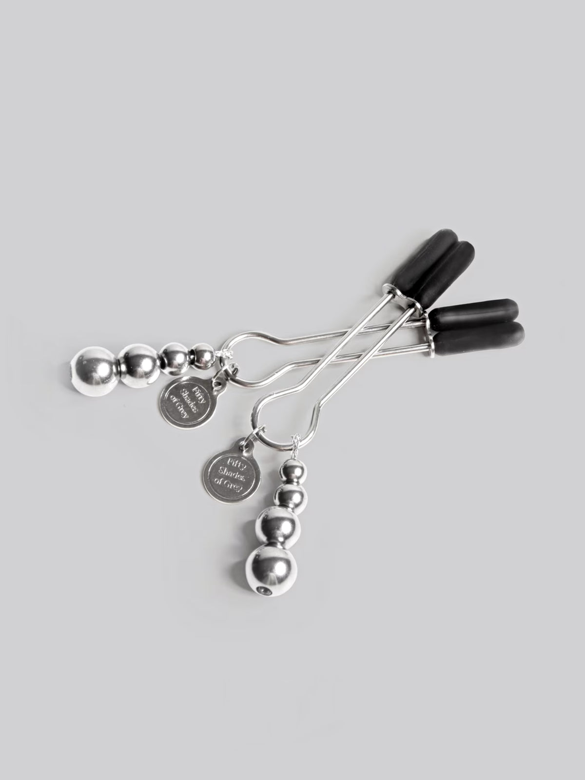 Fifty Shades of Grey The Pinch adjustable nipple clamps featuring calibrated screws and broad rubber tips for tailored tension.