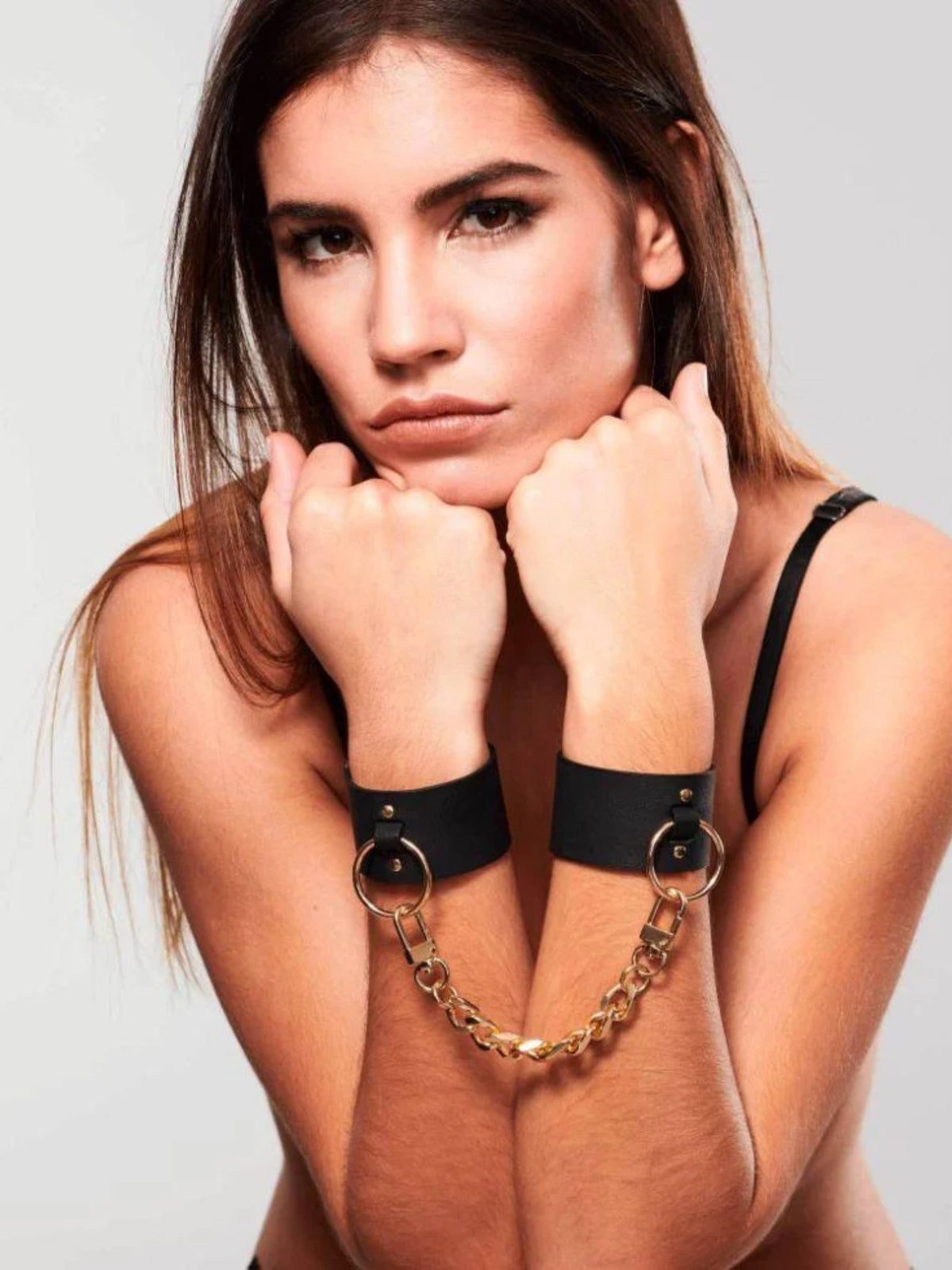 Bijoux Indiscrets MAZE Wide Cuffs featuring adjustable black straps and elegant hardware, designed for refined intimate play.