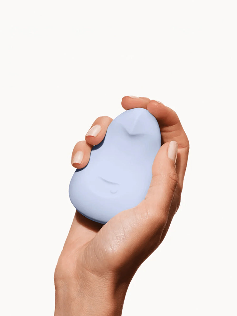 Dame Pom flexible palm vibrator crafted from soft medical-grade silicone for targeted stimulation.
