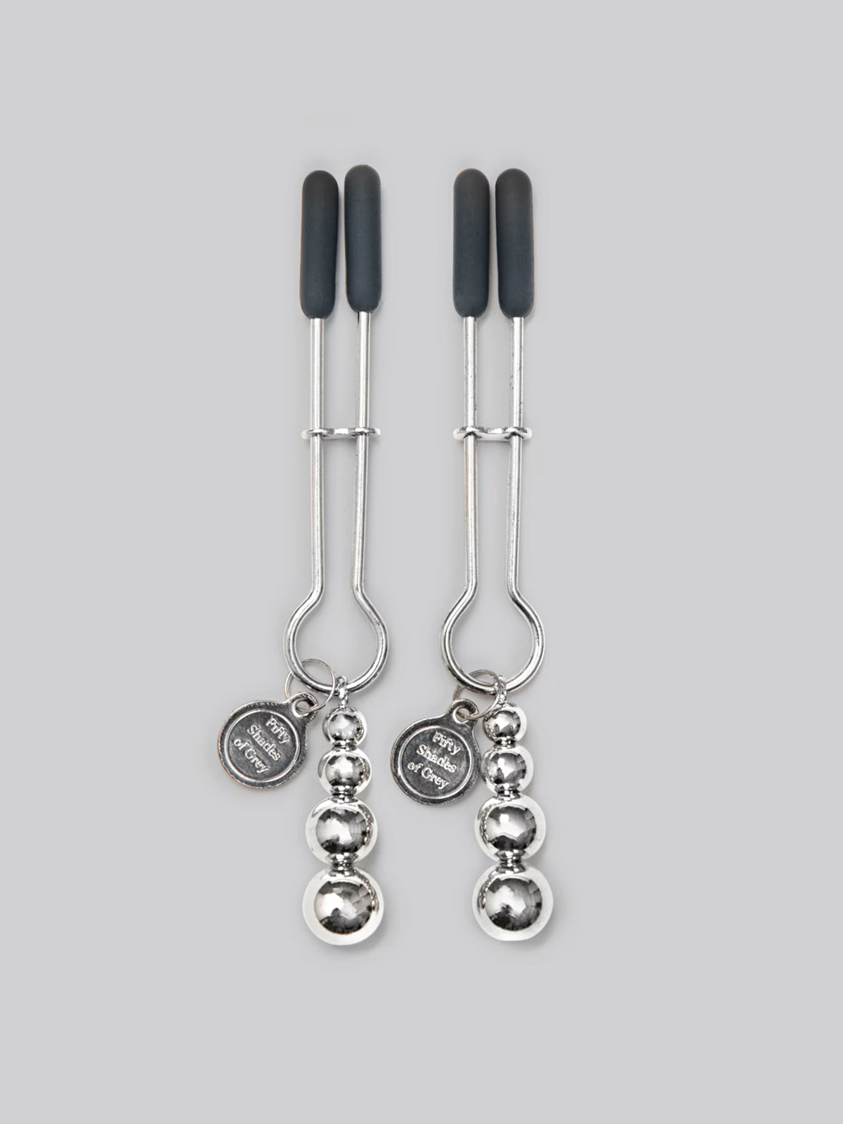 Fifty Shades of Grey The Pinch adjustable nipple clamps featuring calibrated screws and broad rubber tips for tailored tension.