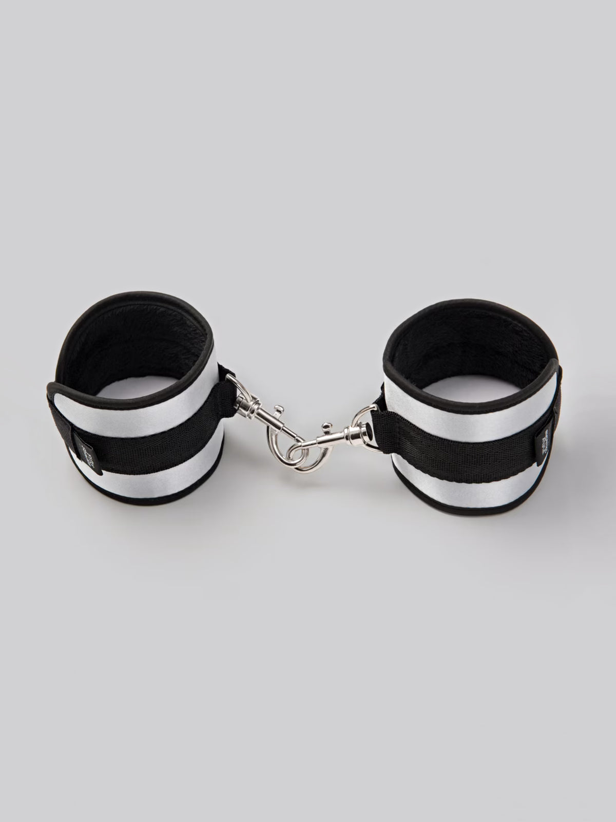 Fifty Shades of Grey Totally His soft velcro restraint cuffs featuring secure D-rings and adjustable straps.